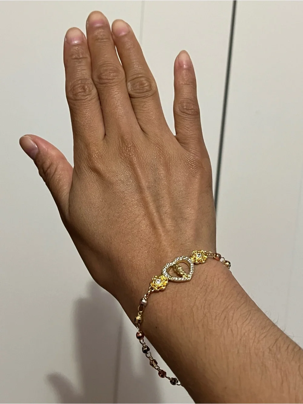 Gold Heart Bracelet with Crystal Accents and Flower Links